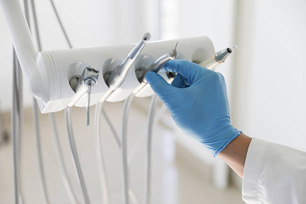 Professional Emergency Dentist technician working in Van Alstyne, TX